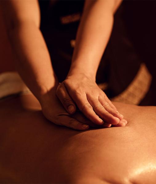 hands on back massaging